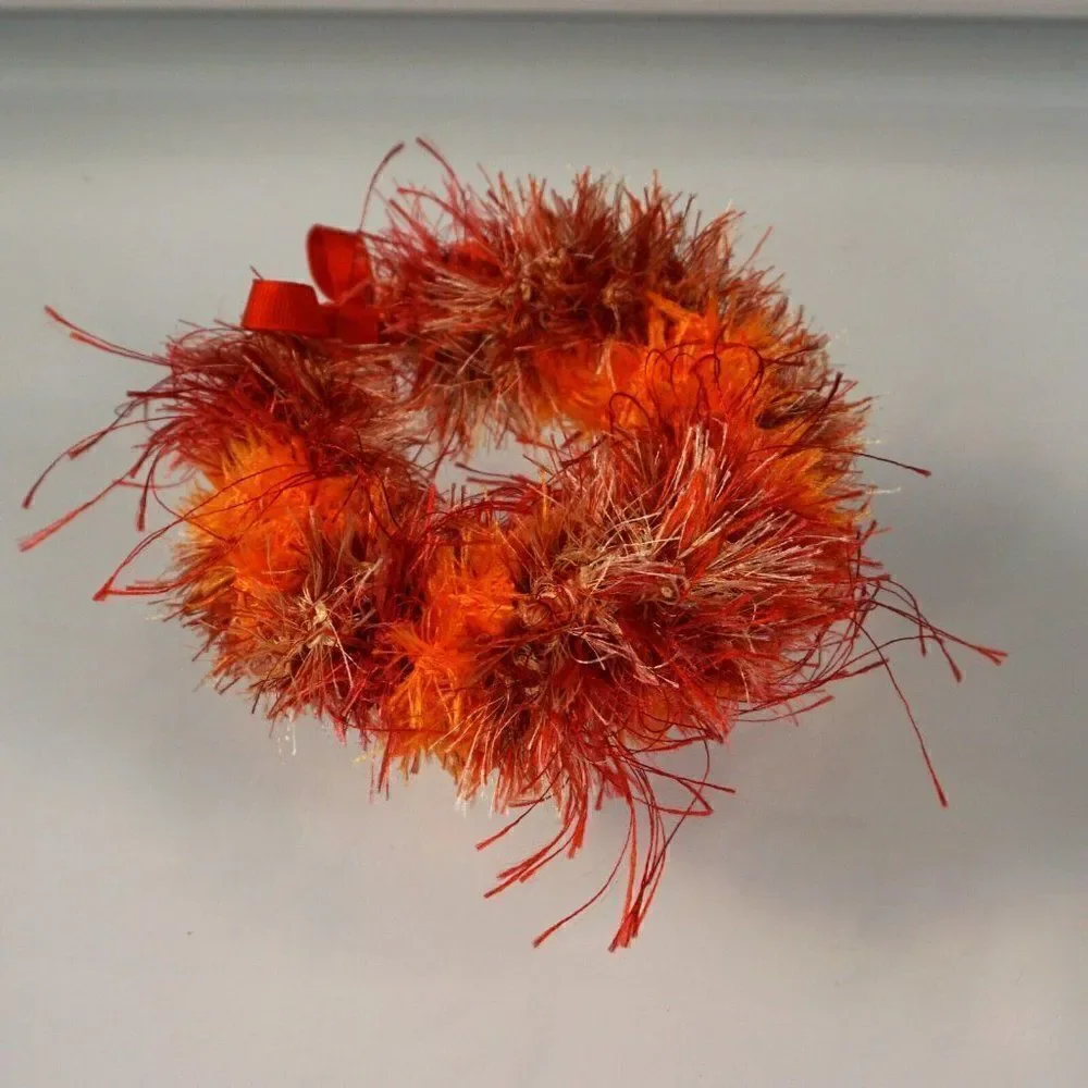 Kupee Wrist Lei Pair Red Orange Eyelash Yarn Tie-Ribbon